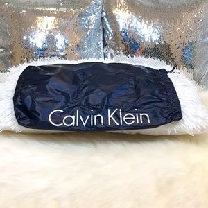 NWOT Calvin Klein Dark Blue Packable Jacket Bag/Drawstring Tie/Outside Pocket